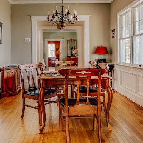 Gather your ensemble for a meal in the grand dining room