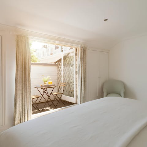 Begin your day with breakfast on the sunny bedroom patio