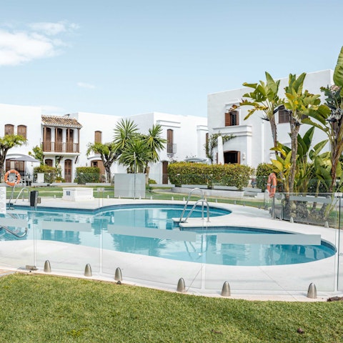 Enjoy a refreshing dip in the shared swimming pool