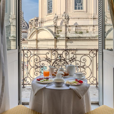 Enjoy breakfast with views of Rome's magnificent landmarks