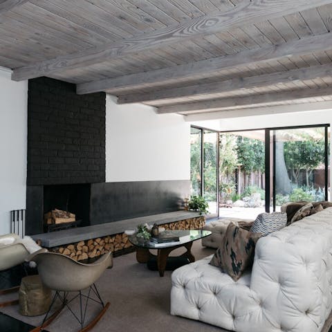Gather around the fireplace to catch up and unwind