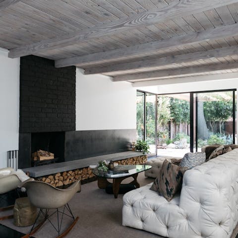 Gather around the fireplace to catch up and unwind
