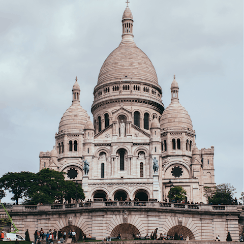 Visit the iconic Sacre Coeur, an eighteen minute walk away