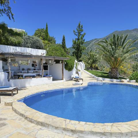 Swim in the pool or sip cocktails in the shade and take in the view