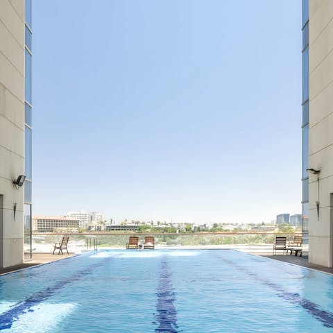 Swim in the sprawling shared pool