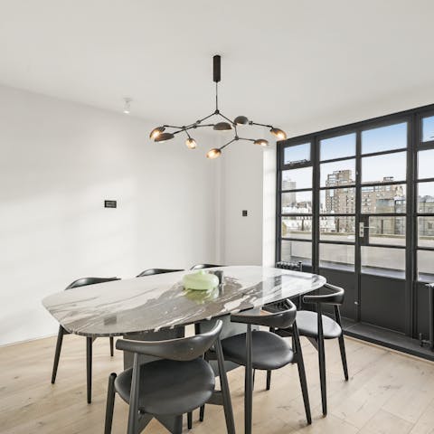 Sit down for a laid-back meal together in the bright dining area