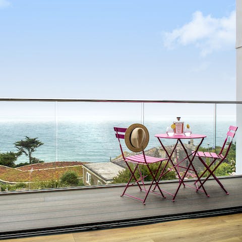 Sip a local craft gin and tonic outside on the balcony