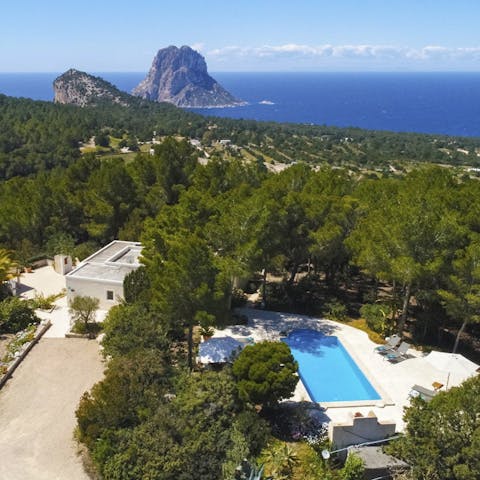 Stay along Ibiza's coastline with views towards mysterious Es Vedrà