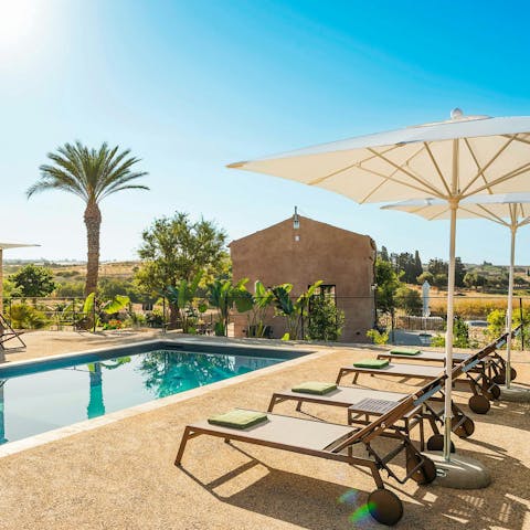 Spend serene days stretched out by the pool