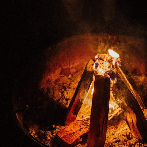 Gather around the fire pit on chilly summer evenings as the stars come out