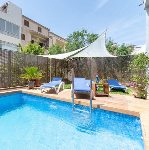This home features a large, private pool and plenty of space for guests to spread out.