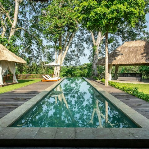 Wake up to a swim in the picturesque pool