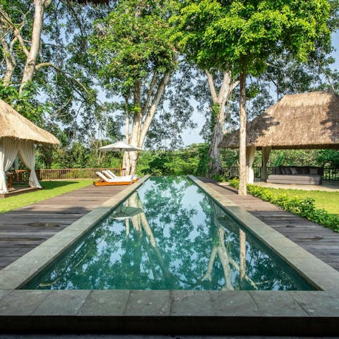 Wake up to a swim in the picturesque pool