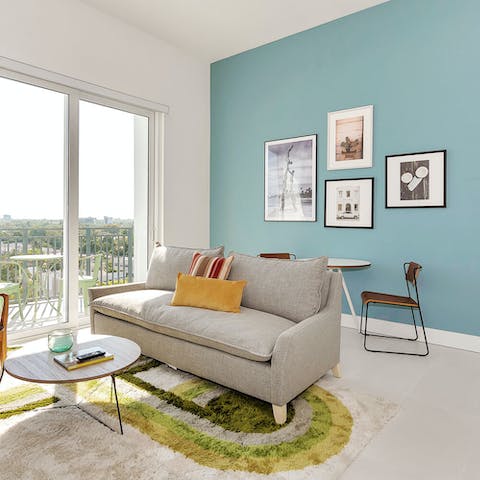 Relax in the bright, artistic living room