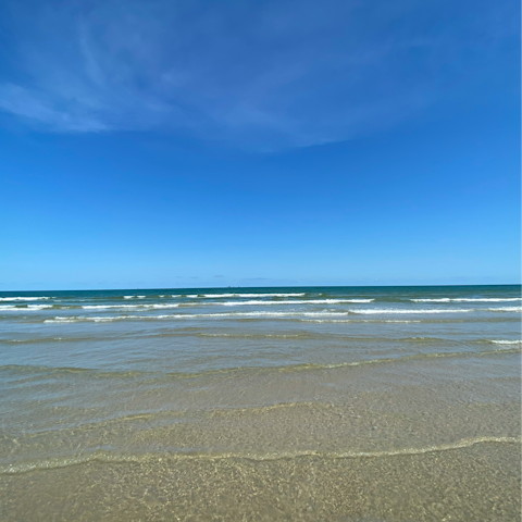 Soak up the sun on Port Aransas Beach, a short drive down the coast