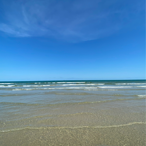 Soak up the sun on Port Aransas Beach, a short drive down the coast