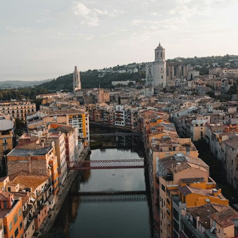 Take a day trip to nearby Girona to wander the cobbled lanes