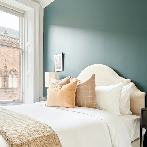 Nod off in the stylish bedrooms with plush bedding
