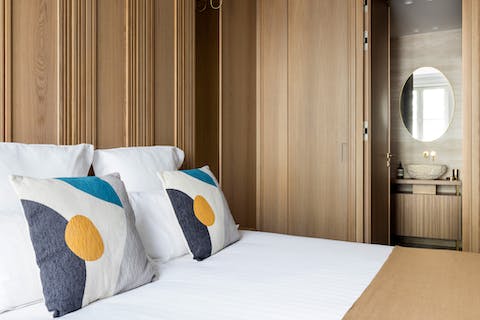 Sink into the comfortable king-size bed after a long day on your feet