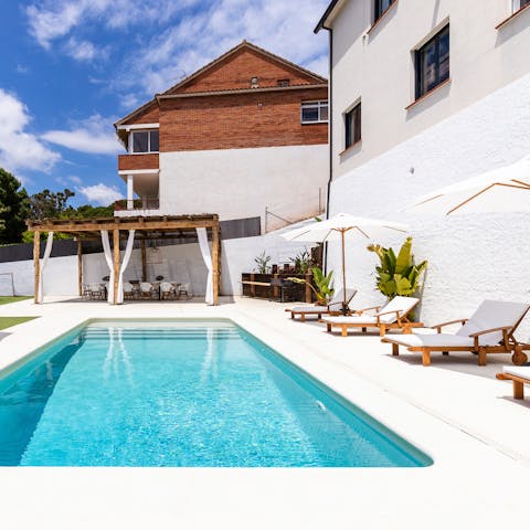 While away hot afternoons reclined on sun beds around the private pool