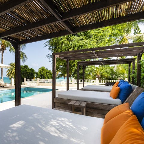 Make the most of the resort's facilities, including the shared pool and sunbeds