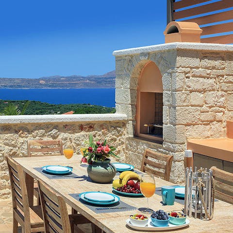 Gather outside for alfresco meals and Greek wine with a view