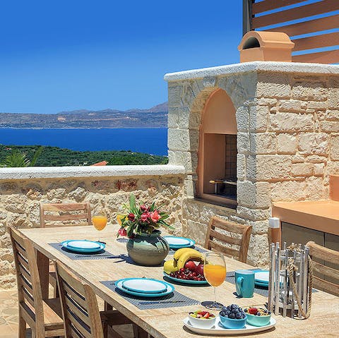 Gather outside for alfresco meals and Greek wine with a view