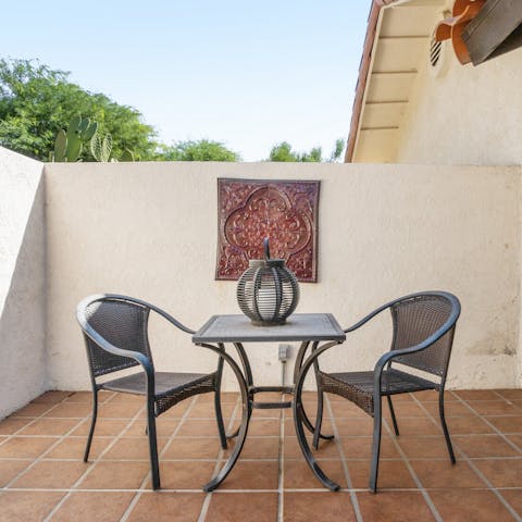 Savour a cooling cocktail on the private terrace