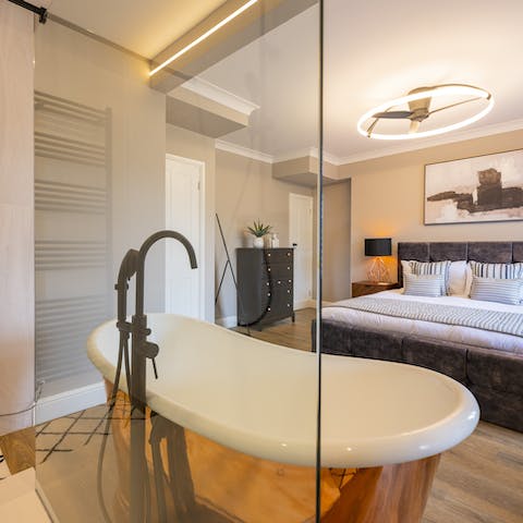 Sneak away to the main bedroom suite for a bubbly soak