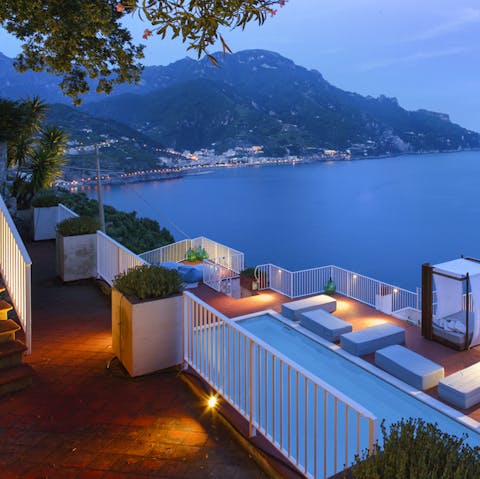 Watch dusk descend over the cliffs of the Amalfi coast