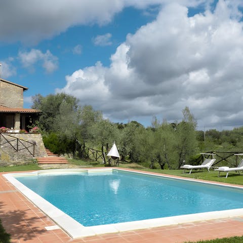 Soak up the sun by the private pool