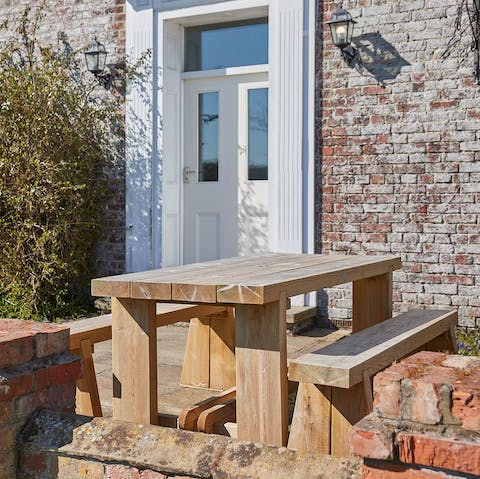 Dine outside in the garden on sunny days