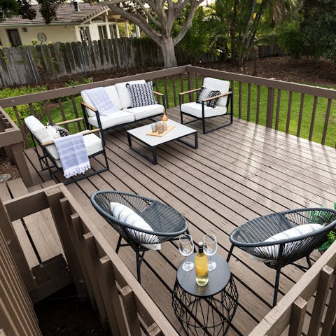Sip an aperitif on the outdoor decking area