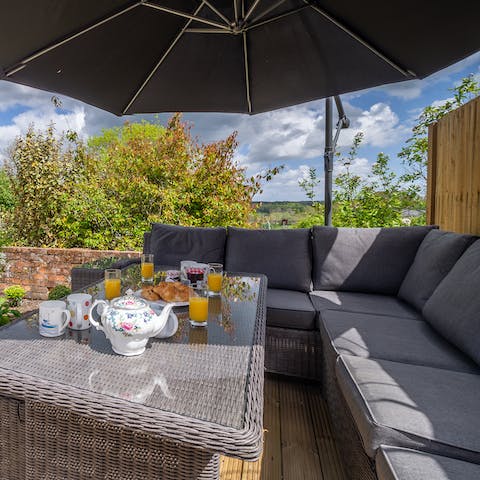 Enjoy breakfast full of local produce from the welcome hamper out in the garden