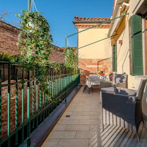 Enjoy an aperitif on the sunny private terrace