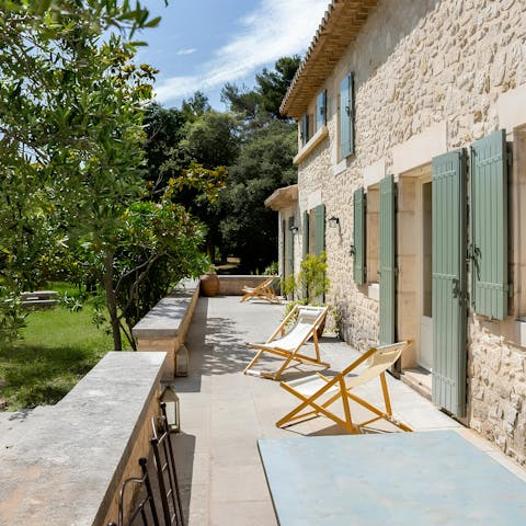 Savour drinks on the patio in the sunshine