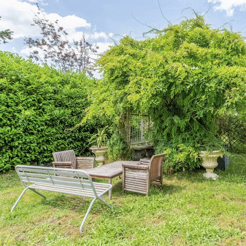 Sit out in the garden and listen to the birds singing in the surrounding trees and flora