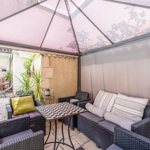 Gather under the gazebo for drinks and animated conversation in the evening after an exciting day