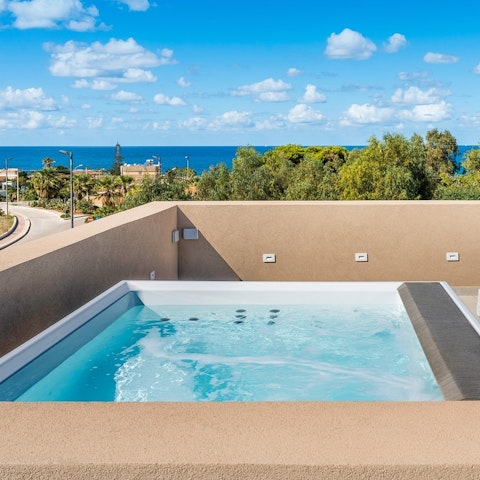 Take a dip in the rooftop jacuzzi