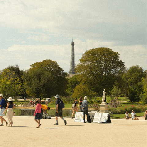 Stroll through nearby Tuileries Garden, admiring the Eiffel Tower views
