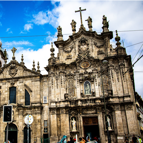 Admire the intricate tiles of the Carmo Church, a twenty-minute walk away