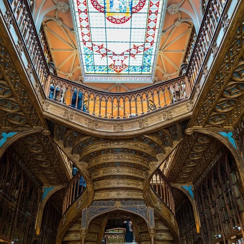 Pick up a new coffee table book from the ornate Livraria Lello