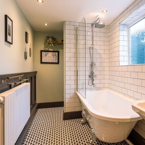Take a long, relaxing soak in the clawfoot bathtub