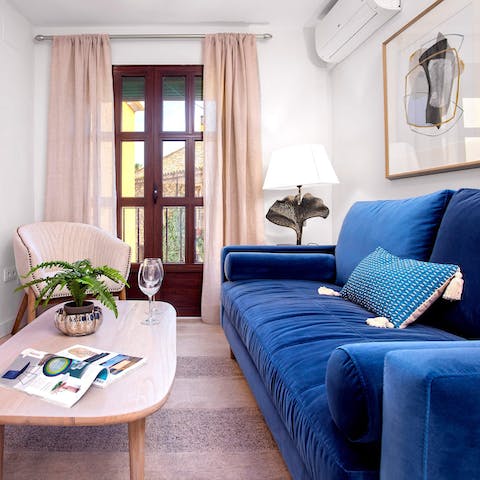 Unwind with a glass of sangria in the comfy lounge area