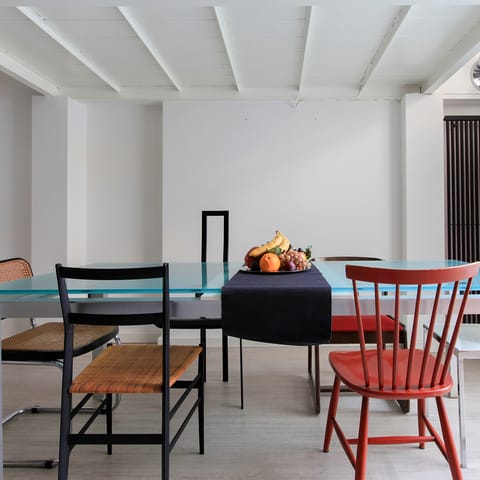 Mismatched chairs in the dining room