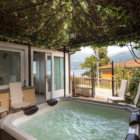Admire the vista from the warmth of the private jacuzzi