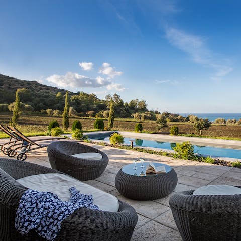Sip a poolside glass of wine at sunset as you take in the stillness and tranquility of your surroundings