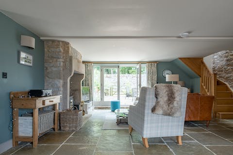 Light up the wood-burner in the 250-year old fireplace and snuggle up on the sofa