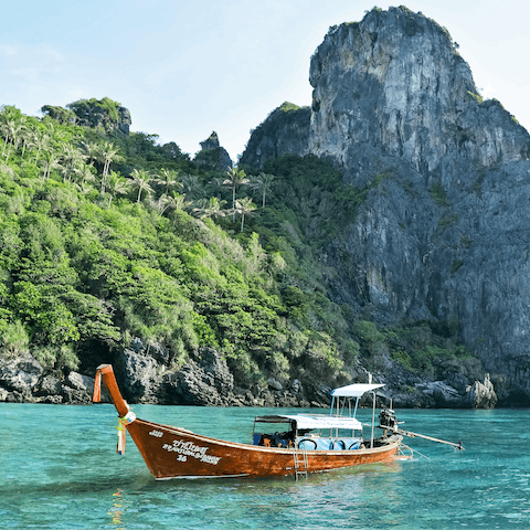 Stay just an eleven-minute walk away from Surin Beach, Phuket