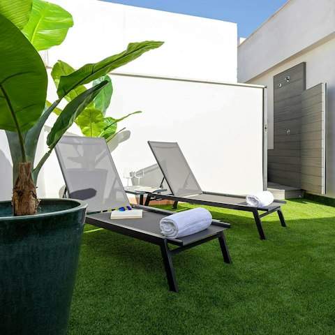 Make sundowners on the private terrace the new routine